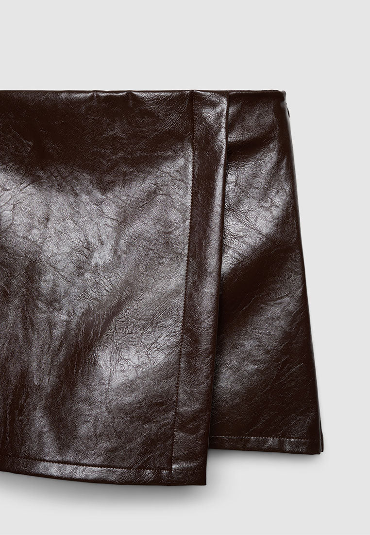 Women's Asymmetric mini skort in faux leather