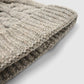 Women's Braided beanie with shimmering pompom