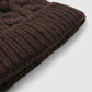 Women's Braided beanie with shimmering pompom