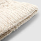 Women's Braided beanie with shimmering pompom